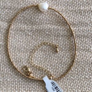 Gold necklace with water pearl